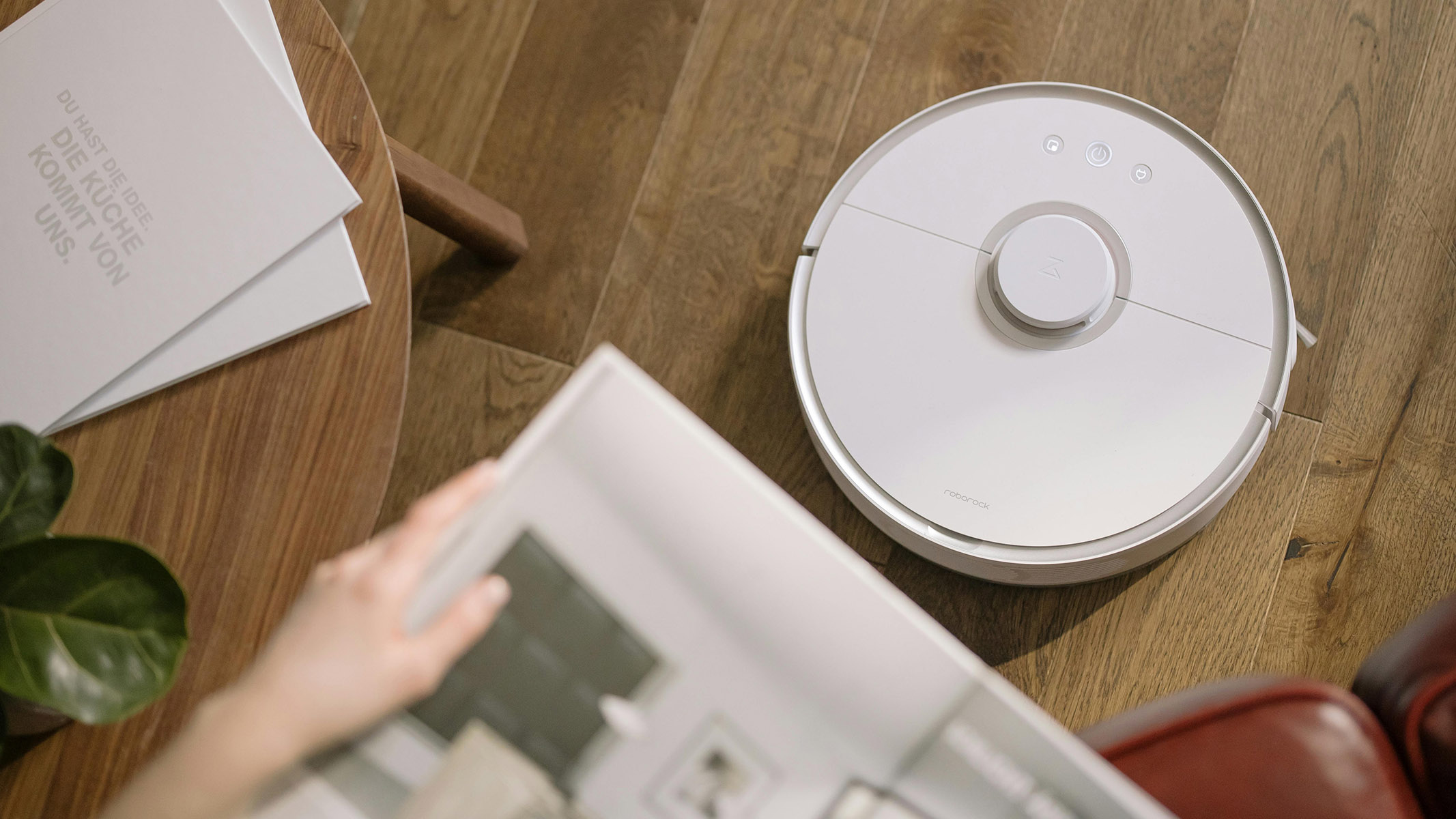 robot vacuum on wooden floor